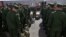 Регрути на руската армија во регионалната собирна станица во Јегоршино пред да заминат на служба во руските вооружени сили во јуни.