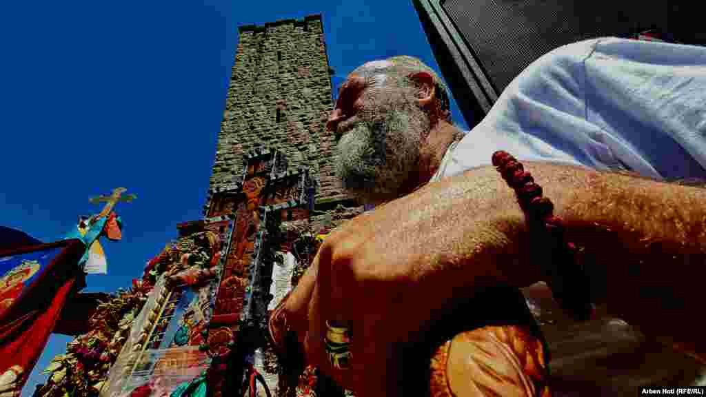 Serbs hold icons as they take part in a ceremony marking the historic Battle of Kosovo at a memorial in Gazimestan, on the outskirts of Pristina, on June 28.