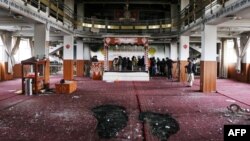 Istražitelji u sikhskom hramu nakon napada u martu 2020. (Ilustrativna fotografija)
