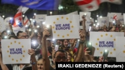 People attend a mass demonstration in support of Georgia's bid country's for EU membership in Tbilisi on June 20.