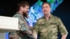 Liderul cecen Ramzan Kadîrov (stânga) și Viktor Zolotov, șeful Gărzii Naționale a Rusiei, în timpul unei ceremonii organizate la Groznîi pentru decorarea militarilor și ofițerilor Gărzii Naționale care au participat la războiul din Ucraina.