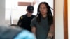 Brittney Griner is escorted to a courtroom for a hearing in Khimki just outside Moscow on June 27.