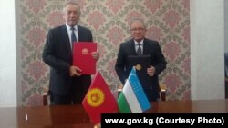 Представители правительственных делегаций Кыргызстана и Узбекистана. 