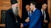 The head of the Serbian Orthodox Church, Patriarch Porfirije (left), and Montenegrin Prime Minister Dritan Abazovic meet in June.