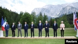 G7 leaders pose for a family photo during the summit at Bavaria's Schloss Elmau castle, near Garmisch-Partenkirchen, Germany, on June 26.