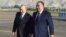Tajik President Emomali Rahmon (right) greets his Russian counterpart, Vladimir Putin, in Dushanbe on June 28. 