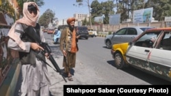 Taliban security forces at a checkpoint in Herat city in July.