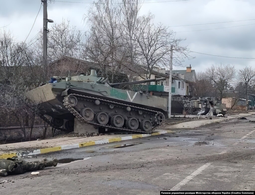 A Russian BMD fighting vehicle stuck on a chunk of concrete after a fierce firefight in Hostomel on March 4.