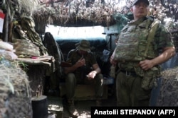 Ukrainian soldiers in an entrenched position on the front line near Avdiyivka on June 18.