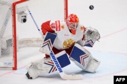  Александър Георгиев с екипа на съветския народен тим по хокей на лед, с който завоюва бронзовите медали на Световното състезание в Словакия през 2019 година 