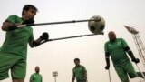Members of the Iraqi national football team for amputees take part in a training session at al-Shaab stadium in Baghdad.