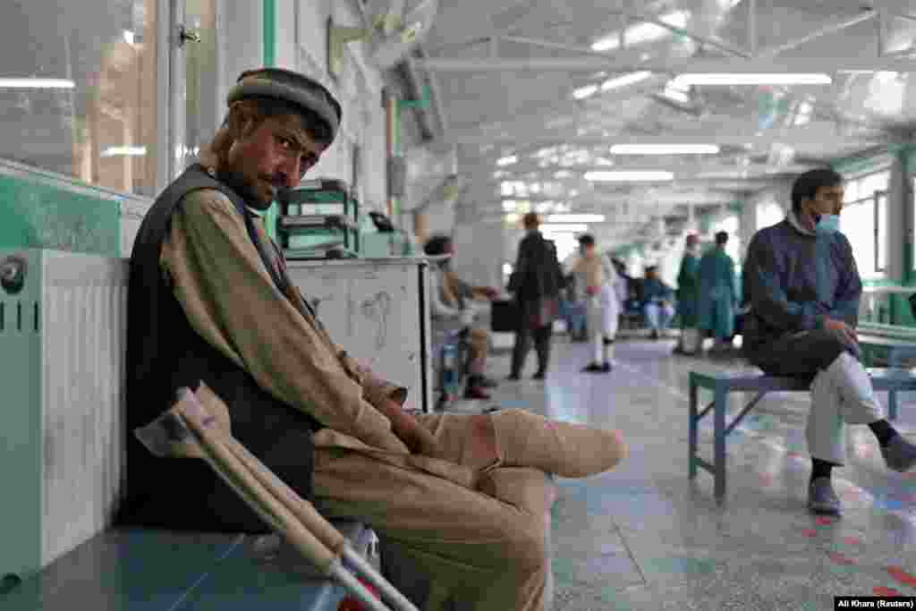 Amanullah, 25, who lost a leg in a mine blast in Helmand, sits at the Red Cross rehabilitation center in Kabul.&nbsp;
