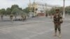 Uzbek soldiers patrol the streets of Nukus on July 3.