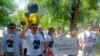 Supporters of jailed Kazakh opposition activist Zhanbolat Mamai celebrated his birthday outside the detention center where he is being held in Almaty on June 15.