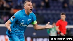 Zenit's Artem Dzyuba celebrates after scoring his side's opening goal during the European League round of 16 first leg playoff between Zenit and Betis at Gazprom Arena in St. Petersburg in February.