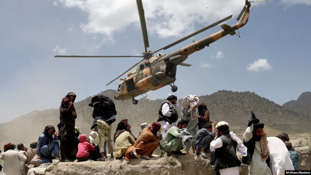 A Taliban helicopter takes off after bringing aid to the site of the earthquake in Gayan in Paktika Province on June 23.