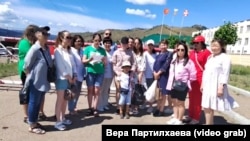The wives of Russian soldiers from Buryatia gather to demand that their husbands be allowed to return home.