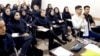 Students attend an English-language learning class in Iran in 2022.