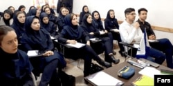 Students attend an English-language learning class in Iran in 2022.