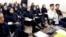 Students attend an English-language learning class in Iran in 2022.