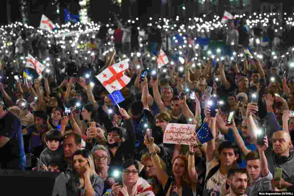 Georgians rally in Tbilisi in favor of European integration on June 24. The rally came a day after EU leaders&nbsp;deferred Tbilisi&#39;s candidacy, recognizing it as a &quot;perspective member&quot; but insisting that candidate status could only be granted as soon as &quot;set priorities are met&quot; and widespread reforms are put in place.