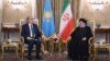 Kazakh President Qasym-Zhomart Toqaev met with Iranian President Ebrahim Raisi in Tehran on June 19.