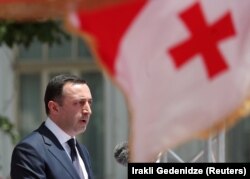 Prime Minister Irakli Garibashvili delivers a speech during Independence Day celebrations in Tbilisi on May 26.