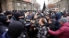 Protesters scuffle with police during a demonstration against the government's planned coronavirus restrictions in Sofia on November 25.