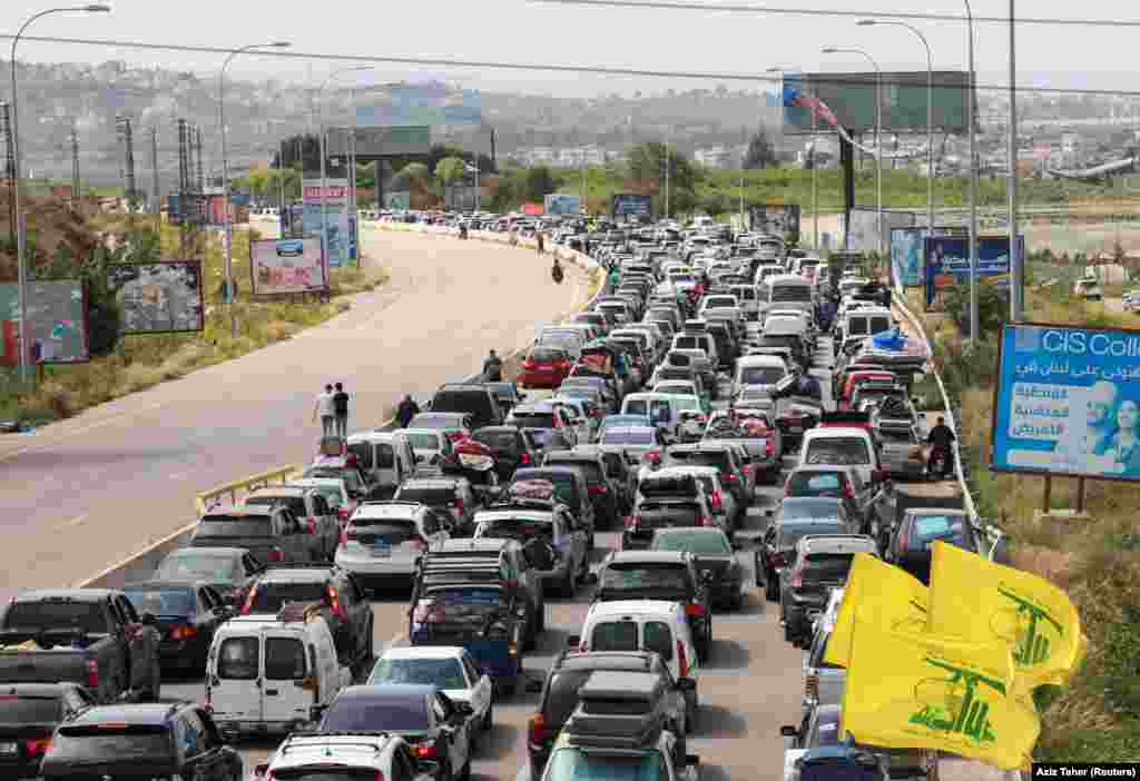 Cars clog the road near Tyre, southern Lebanon, on April 17 as displaced people return home after a 10-day cease-fire between Lebanon and Israel went into effect.