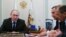 Russian President Vladimir Putin attends a meeting with members of the government at the Novo-Ogaryovo state residence outside Moscow on April 9.