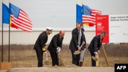 Romania -- (L-R) US Vice Admiral James D Syring, Romanian President Traian Basescu, James N Miller , US Undersecretary of Defense for Policy (USDP) and Mircea Dusa, Romanian Defence Minister, Deveselu village, October 28, 2013.