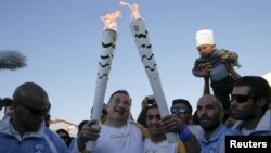Біженець із Сирії проніс олімпійський вогонь Афінами