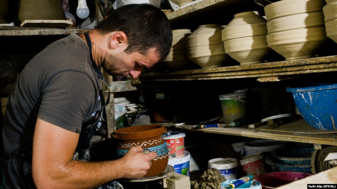 Dusan Stojanovic, who has a master's degree in occupational safety engineering, says he inherited the craft of making clay vessels from his family.