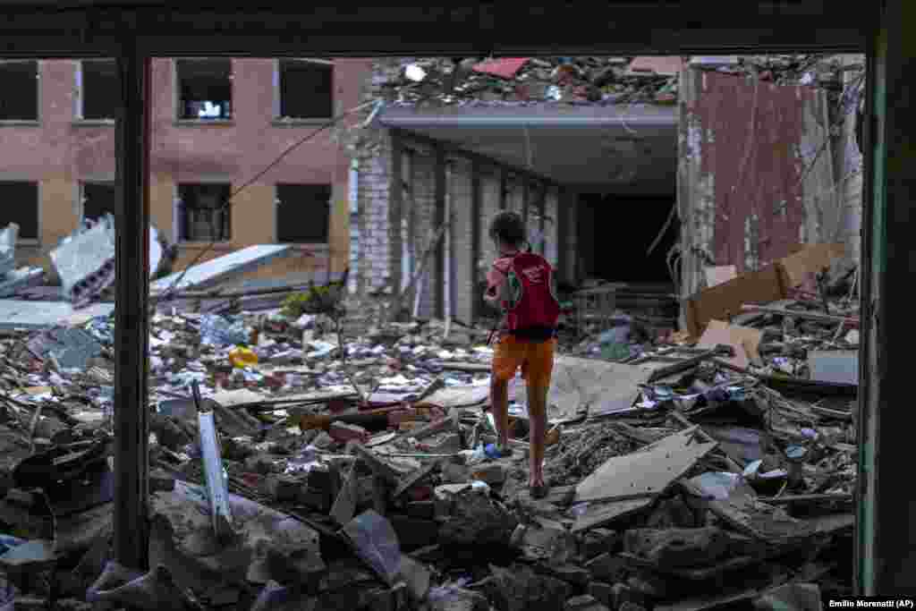 &quot;I feel offended when I&#39;m at my school. I resent that the Russians destroyed my school,&quot; said Ivan Hubenko, 11 as he walks through the shattered courtyard where he and his friends once played.