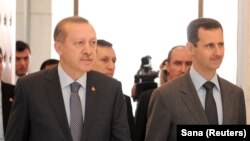 Türkiýäniň prezidenti Rejep Taýyp Erdogan we Siriýanyň prezidenti Başar al-Assad. Damask. Ýanwar, 2011 ý. 