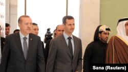 Башар Асад и Раджаб Тайип Эрдоган на встрече в Дамаске. 17 января 2011 года. 