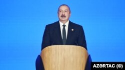 Azerbaijani President Ilham Aliyev makes a speech at an event marking the 30th anniversary of the Yeni (New) Azerbaijan Party. November 21, 2022.