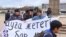 Kazakh Police Detain Protesters On Election Day