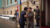 Ukrainian President Volodymyr Zelenskiy (right) welcomes British Prime Minister Rishi Sunak to Kyiv on November 19.