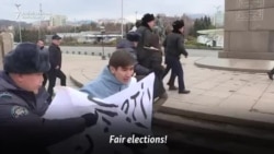 Kazakh Police Detain Protesters On Election Day