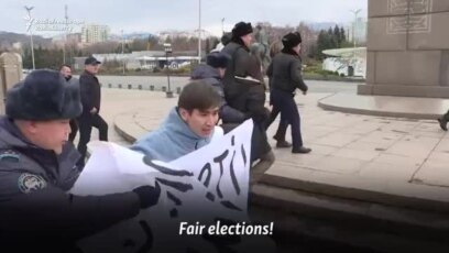 Kazakh Police Detain Protesters On Election Day