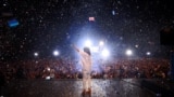 Argentina's Vice President Cristina Fernandez de Kirchner waves to supporters at the end of a party rally