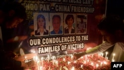 تصاویر سه تبعه چین و راننده پاکستانی آنان که در حمله انتحاری ماه اپریل در شهر کراچی جان دادند