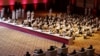 Delegates attend the commencement of talks between the Afghan government and Taliban insurgents in Doha on September 12.