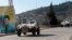 UN peacekeepers patrol near the Lebanese-Israeli border.