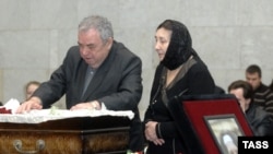 Larisa and Eduard Baburov at a memorial service for their daughter in Moscow on January 23, 2009.