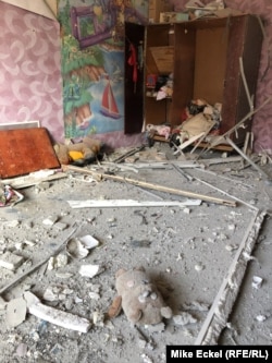 A child's stuffed animal can be seen among the debris in an apartment damaged by a barrage of Grad rockets fired at the town of Tryokhizbenka in eastern Ukraine. No one was injured in the attack, which appeared to target a Ukrainian infantry company garrisoned in a nearby building.