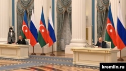 Ռուսաստանի նախագահ Վլադիմիր Պուտինը և Ադրբեջանի նախագահ Իլհամ Ալիևը ստորագրում են երկու երկրների միջև դաշնակցային փոխգործակցության մասին հռչակագիրը, Մոսկվա, 22-ը փետրվարի, 2022թ․