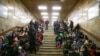 Civilians take shelter in the Kyiv subway. The subterranean railway has some of the deepest stations in the world with one located more than 100 meters underground.&nbsp;