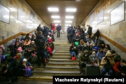 Civilians take shelter in the Kyiv subway.